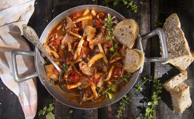 Pioppino mushroom stew in a plate. 